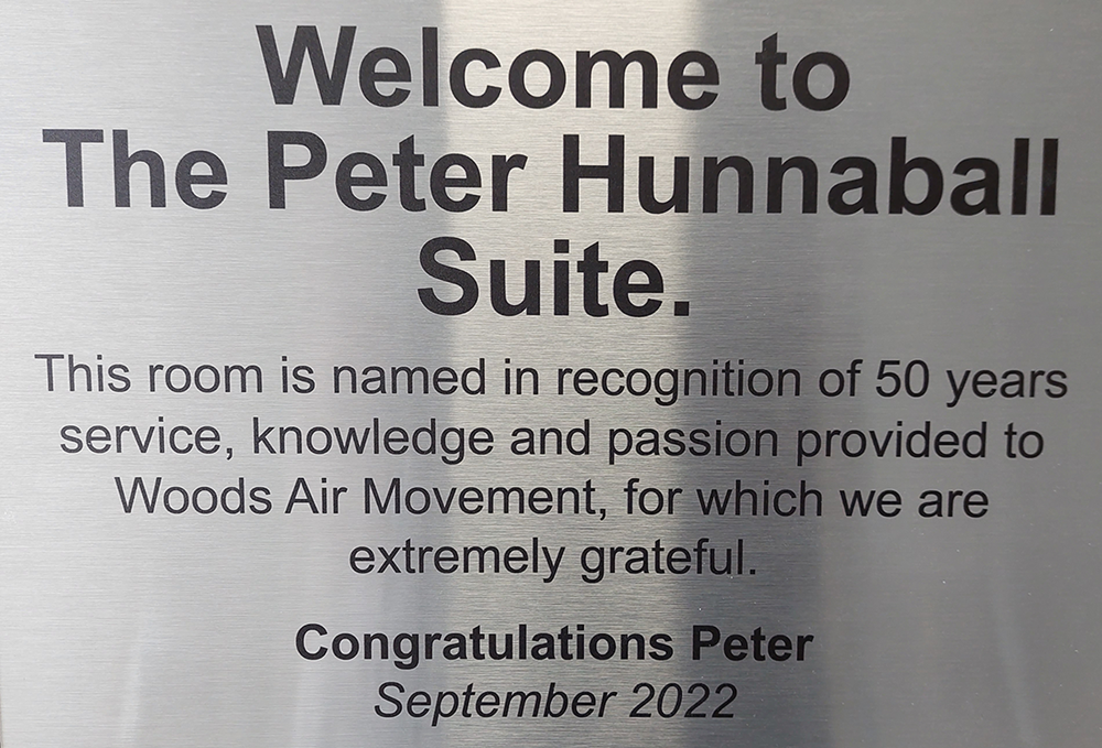 The plaque inside the newly named meeting room in honour of Peter's years of dedication to Woods.