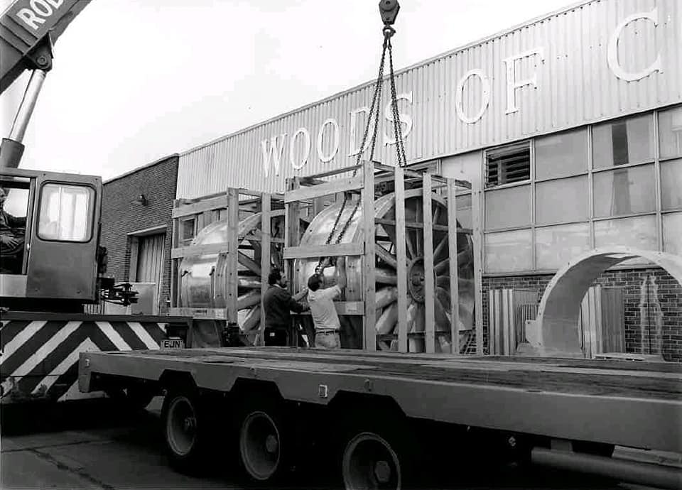 An old black & white photo taken outside the Woods Factory in the 1960s